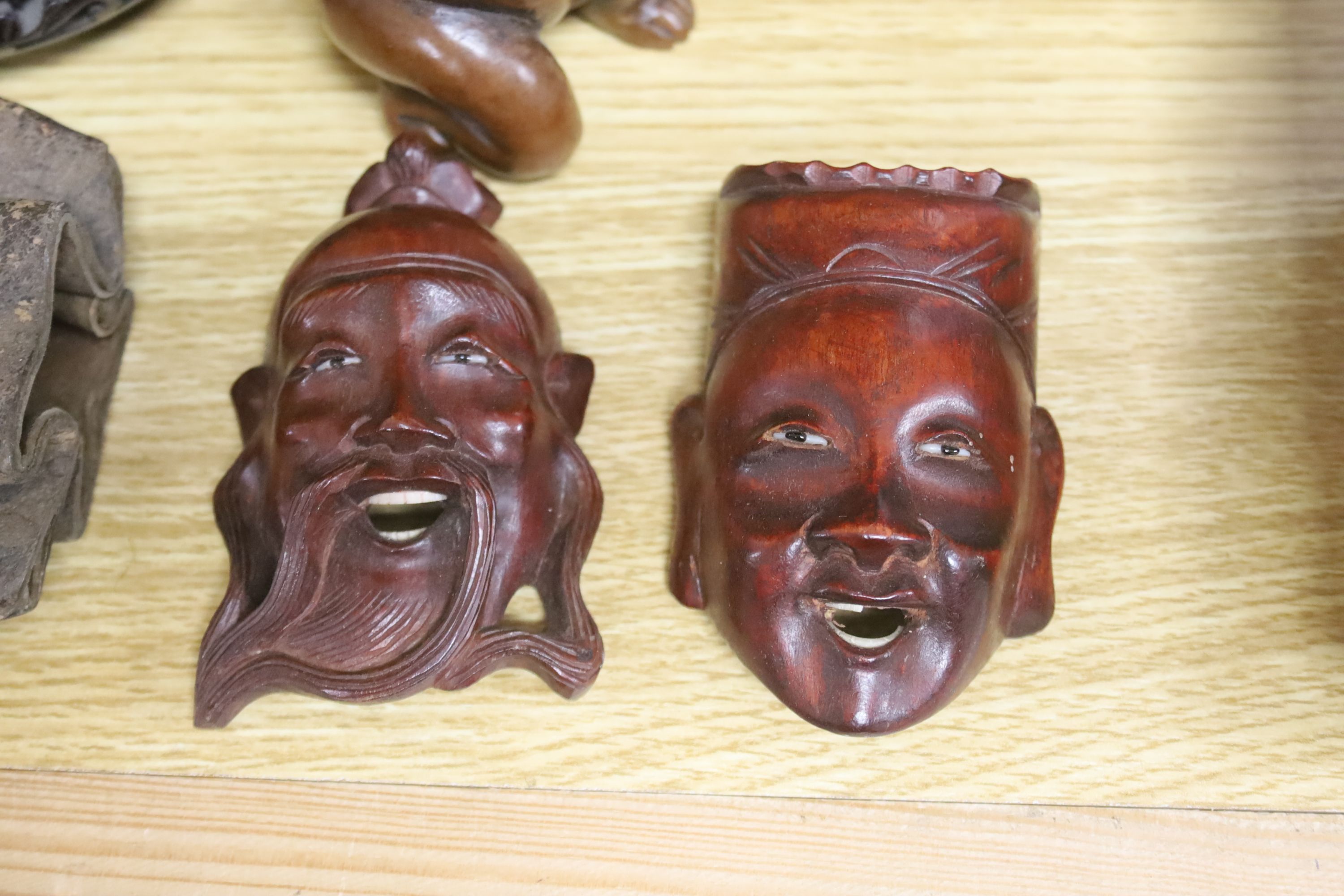 A quantity of Chinese hardwood stands and carvings